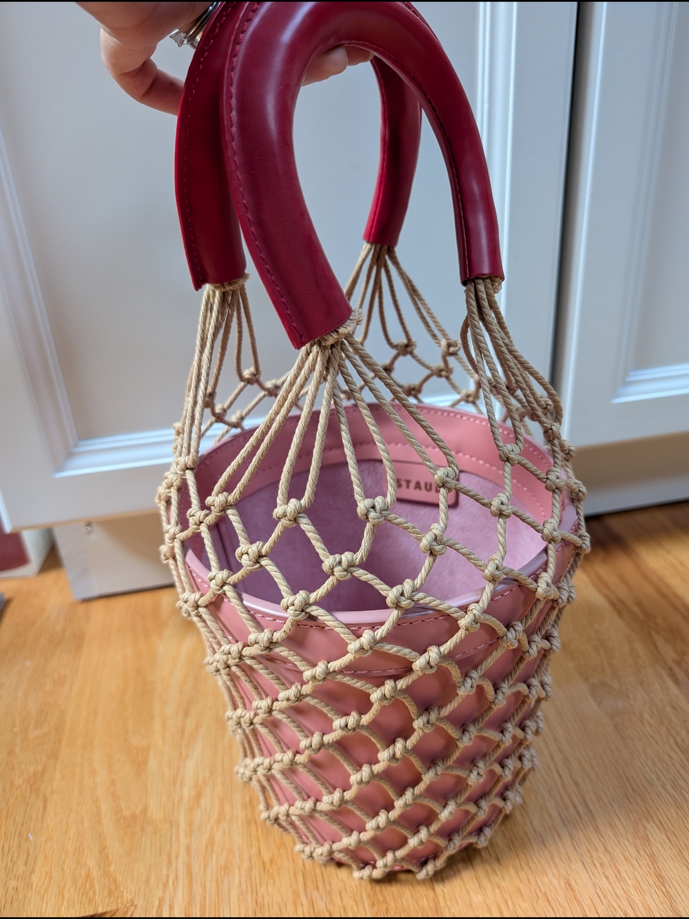 Staud Pink Moreau Macramé Net and Leather Bucket Bag With Red Handles